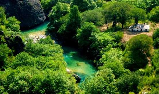 Day 3 A Monument of Nature Photo: The springs of Voidomatis. We will set off with a short scenic hike to Mikro Papigo one of the best-kept traditional stone villages in Greece.