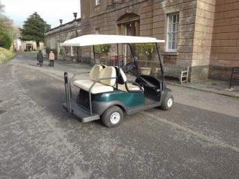 The American Museum golf buggy outside the entrance to the main museum collection Arrival Path to