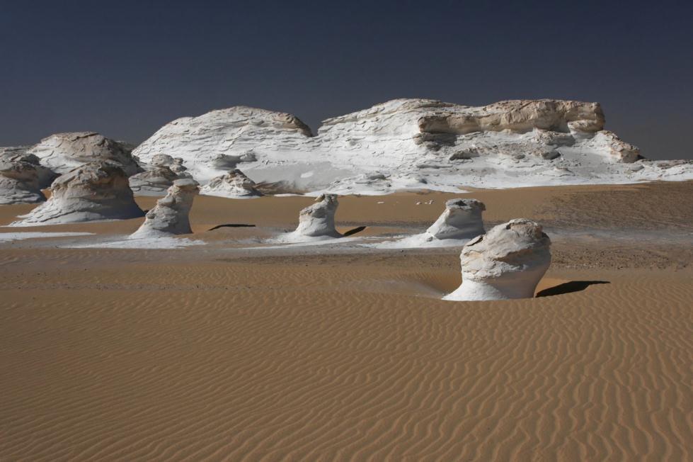 Natural White Desert Nile River Cruise Bulbous white rocks in strange shapes and sizes rise from the desert about 28 miles north of the town of Farafra in western Egypt.