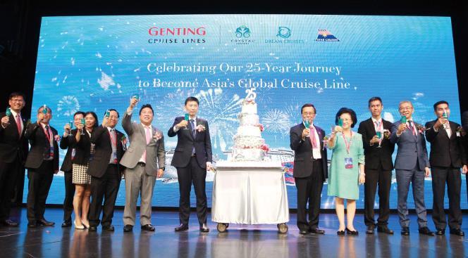 Julia Chang, Representative, National Association of Travel Agents Singapore Genting Cruise Lines presents a symbolic cheque for USD125,000 in cabin equivalent to Make A Wish International.