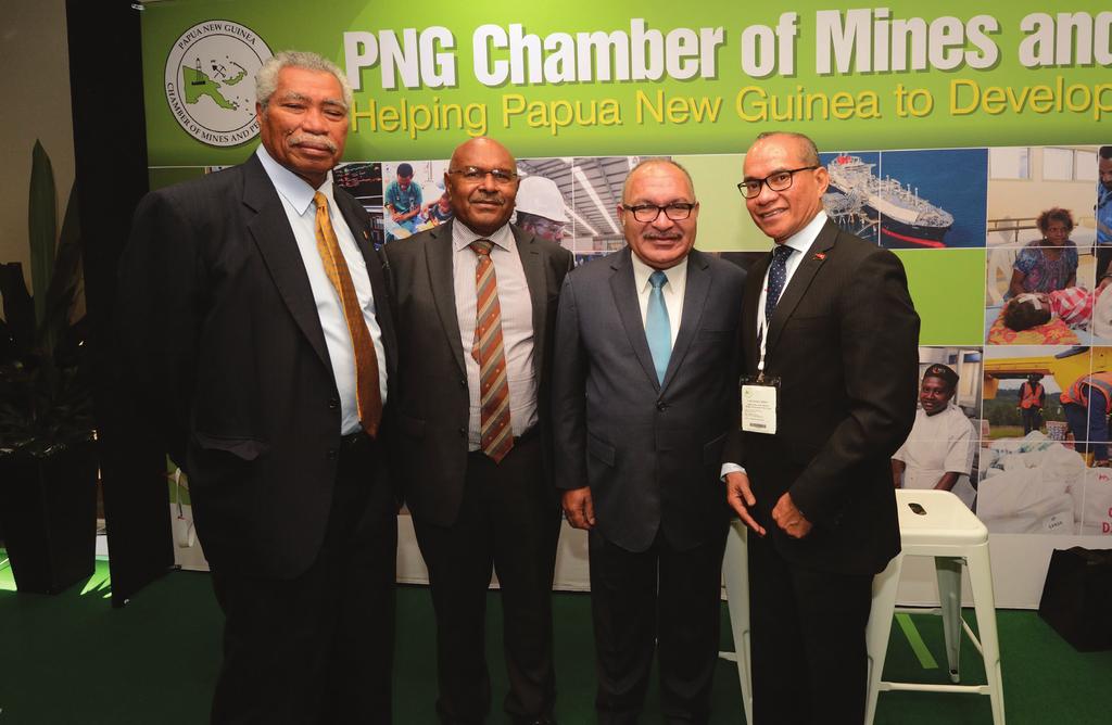 Good and stable legislation needed to drive further investment Prime Minister Peter O Neill with Chamber President Mr Gerea Aopi (far left), Chamber Executive Director Dr.