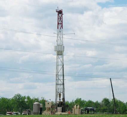 Oil & gas and mining Richness of natural resources attracts big-name players A drilling rig at work near DeBolt.