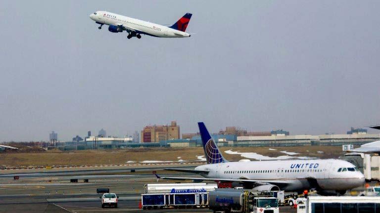 A jet lifts off from a runway at LaGuardia Airport on Feb. 27, 2014.
