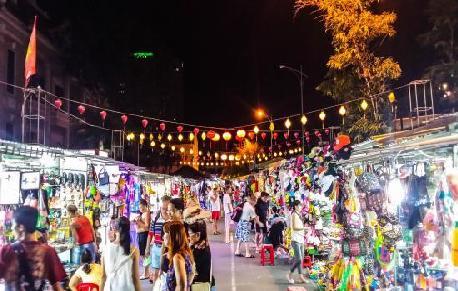 the beach and the street at night Visit Nha Trang night food market is located in the