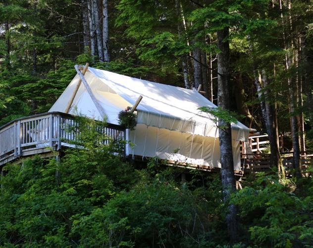 In-tent bathroom with heated floor, flush toilet, double sinks and private outdoor shower. Sleeps 5 with cot.