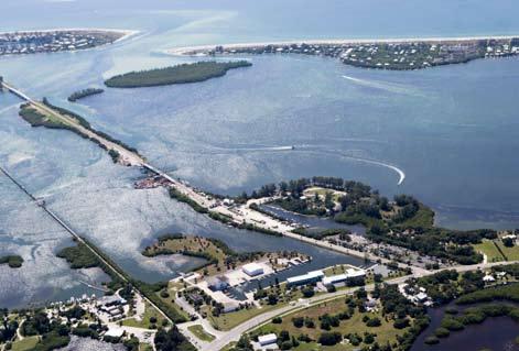ad C.R.771/775 from the I-75 corridor, the Property is located south of the Cape Coral Airport and Boca Grande Jet Center, and extends south almost to Creekside Way.