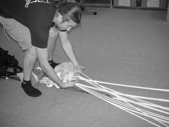 SECTION: PACKING TMAN 002-FEB 2005 - REV 0 Move up the lines, allowing them to slide between your fingers.