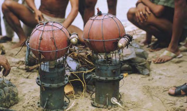 massive Tet Offensive. Ingenious floating mines found in river inlet near Vung Tau?