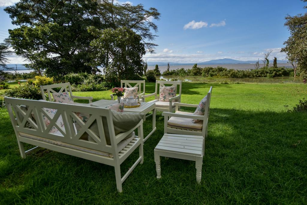 ACCOMMODATION LAKE NAIVASHA NATIONAL PARK LOLDIA HOUSE Nestled away in a grove of acacia trees overlooking the gently lapping waters of Lake Naivasha, Loldia House is a wonderfully traditional old