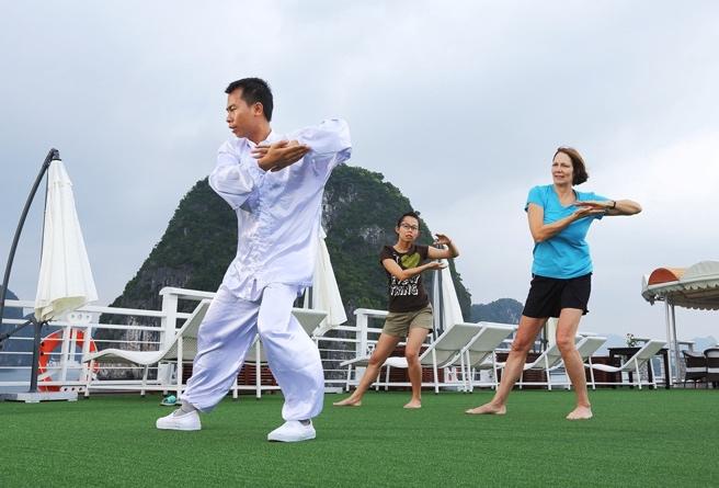 Day 4: Halong bay Hanoi (B,L) Starting Your day with Tai Chi on the Sundeck.