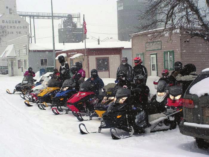 SUMMARY South Dakota s miles and miles of snowmobiling trails are a valuable resource for
