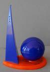 Lot # 215 - Blue and orange, plastic, one-piece salt and pepper shaker in the shape of the Trylon and Perisphere. The base is orange with the words, "New York World's Fair" in gold letters.