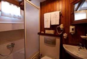 All cabins are equipped with private services with hot and cold water, shower box with 1/4 bathtub and