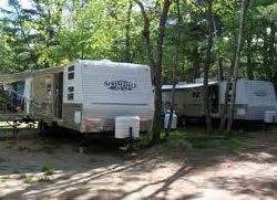 Can accommodate RVs up to 45 Wi-Fi, 2 comfort stations, showers, dump station, propane, security gate & guard, pavilion, fire rings, picnic tables, clubhouse, and laundry. Mt.