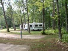 Can accommodate RVs up to 90. Wi-Fi, cable TV, restrooms, showers, laundry, propane, camp store, screened pavilion, picnic tables, fire rings, and firewood. Conway Scenic Railroad Polar Caves Park Mt.