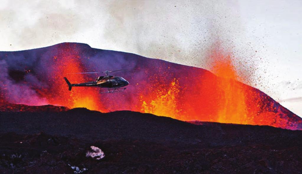 Iceland s erupting volcano 2 The volcano erupting in Iceland has become an instant tourist attraction. Tom Robbins travels by snowmobile and helicopter to see the show.