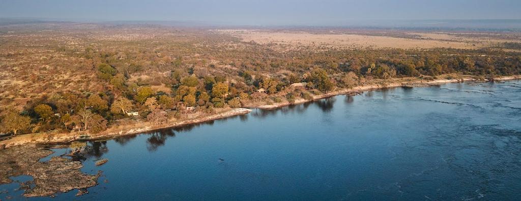 Mpala Jena Camp is an exclusive canvas tented camp, located on a private concession within the Zambezi National Park, just outside Victoria Falls.