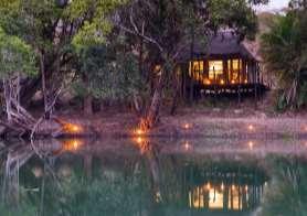 Exploring remote areas of the Kafue National Park, you can enjoy accommodation in an authentic bush camp nestled amongst trees overlooking an immense dambo, a charming seasonal tented