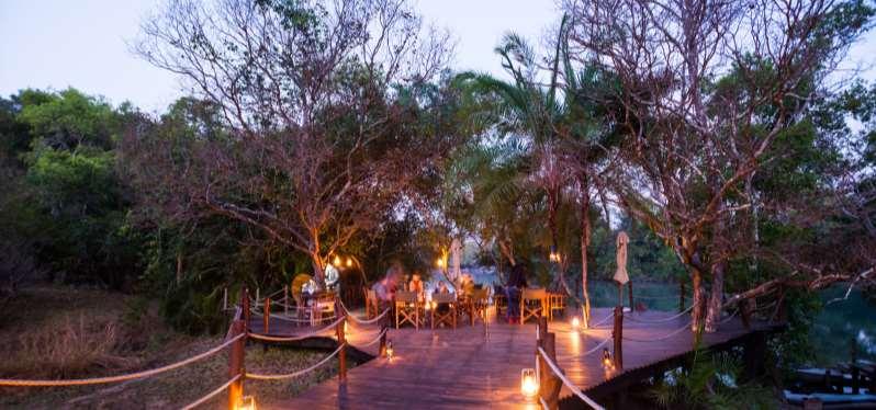 Set on raised individual private wooden decks, each overlooking their own piece of the Kafue river, KaingU Safari Lodge comprises six boutique tents with en-suite bathrooms, indoor