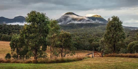 Introducing an unforgettable two-day guided hike that explores Queensland s beautiful Scenic Rim region, located approximately 1.5 hours from Brisbane s CBD.