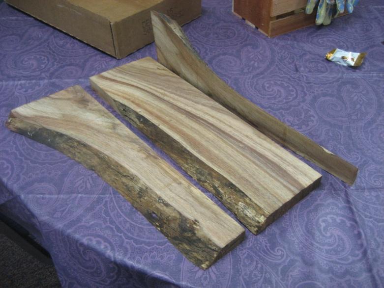 Show and tell: Ron Sexton Ron brought in some of his black acacia fire wood showing examples of some of the fine grain patterns. There were several slabs resawed from the same log.