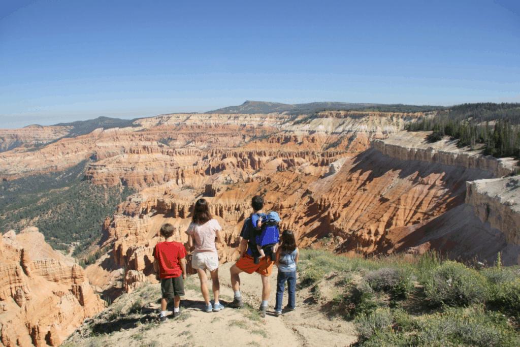 A young family enjoying a spectacular view at Cedar Breaks National Monument.