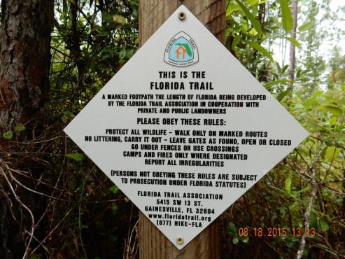 TITLE: Florida National Scenic Trail Obey These Rules w/fnst Marker (8 x 8 ) CLASS: Regulatory PURPOSE / USE: Identifies Florida Trail, FTA volunteers as maintainers, permitted uses and provides FTA