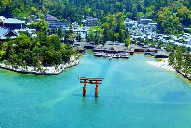 The island is perhaps best known for the red torii gate of Itsukushima Shrine which appears to be floating in the sea.