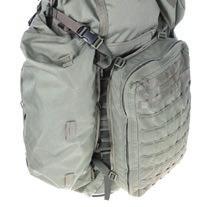 It has attachment bands on the outside and a Velcro loop inside were you can attach our insert pouches.