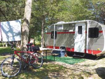One additional pup tent allowed per site. Maximum of seven people per site. One picnic table is provided at each site. Bath/shower house buildings include showers and flush toilets.