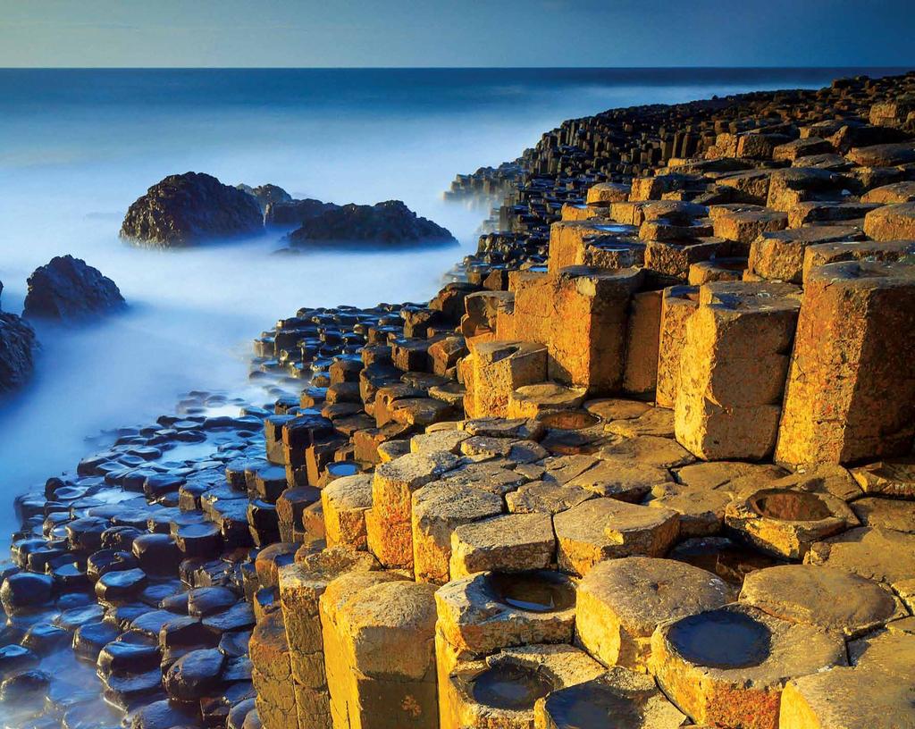 Photo 4Corners Images OCTOBER TWENTY NINETEEN Giant s Causeway, County Antrim, Northern Ireland The distinctive basalt columns of the Giant s Causeway, caused by ancient volcanic eruptions, are