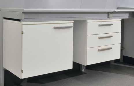 Special highlights in laboratory design can be set by using walnut veneer fronts. Our overbench cabinets are fastened to the service spine or wall without a visible gap.