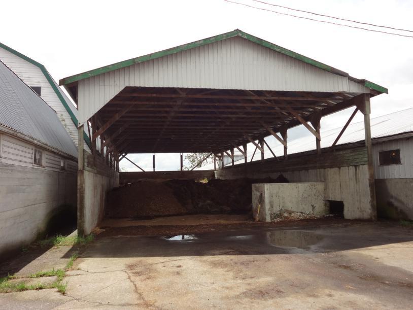 Manure Bunker - +/- 2,970 sq.ft. (33 x 90 ) bunker with a 6 concrete perimeter wall and open post roof supports above.