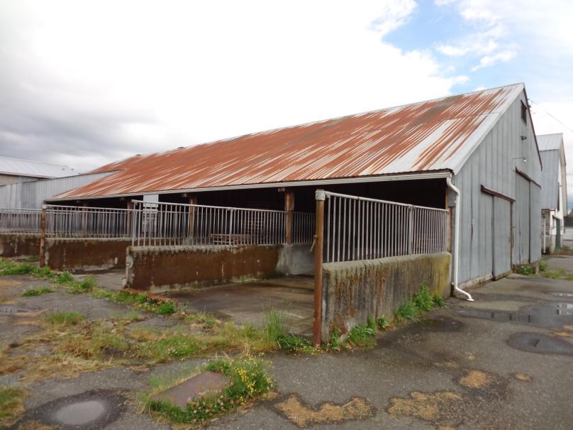 with steel framed bull pens, tool room, bedding storage and external steel pens Layoff Barn #1 - +/-12,760 sq.ft.