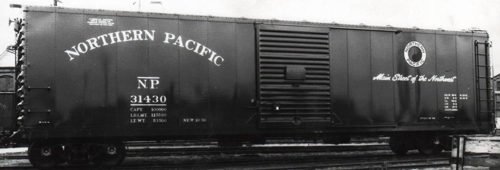 NP 31000-31499 XM Boxcar, 50 BLT by Brainerd, 1950 MTM Image Classic arched NORTHERN PACIFIC Lease stencil, interesting that its not in the extreme