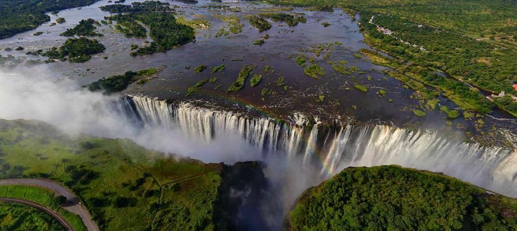 ZAMBIA Livingstone and the Victoria Falls DESCRIPTION The Victoria Falls are one of the 7 Natural Wonders of the world and are located approximately half way in the course of the Zambezi river, at