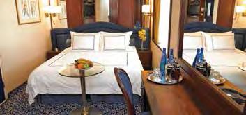 The coveieces withi each stateroom are just as accommodatig ad iclude a vaity desk, refrigerated mii-bar, breakfast table ad spacious seatig area.