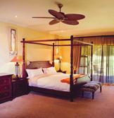 African-colonial styled en-suite bedrooms.