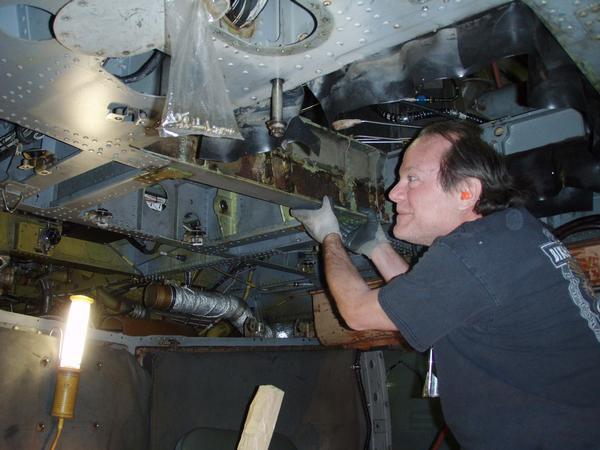 In February, Sheet Metal Mechanic Toy White removes a cracked aft transmission support beam on an SH-60B Seahawk Helicopter assigned to Helicopter Anti-Submarine Squadron Light (HSL) 48 based in