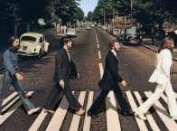 34. On what London thoroughfare did The Beatles photograph their iconic album cover?