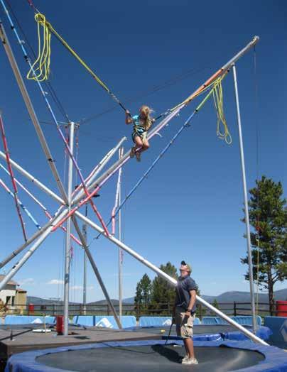 Rebound Trampoline - Catch some air at 10,000 feet on a modified trampoline with waist harness attached to bungee cords.