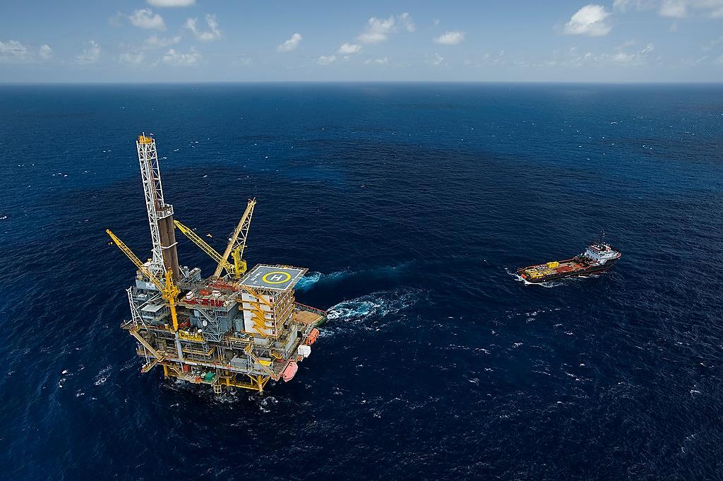 A natural gas platform on Trinidad s east coast Activity Explain in a few sentences, how the waters that surround the Caribbean are beneficial to the inhabitants of the Caribbean islands.