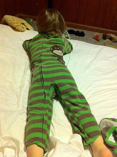 Put footie PJs on your kiddos backwards if they