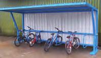 The Theta shelter is ideal for storing either cycle and/or motorcycles. Cycle racks can be adapted to hold junior cycles and/or scooters.