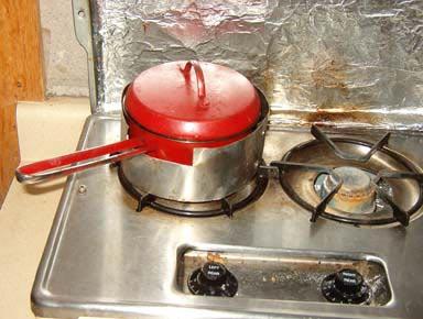 The Pot: A short, broad-bottom vessel, such as a covered skillet, heats more efficiently than a tall, narrow pot.