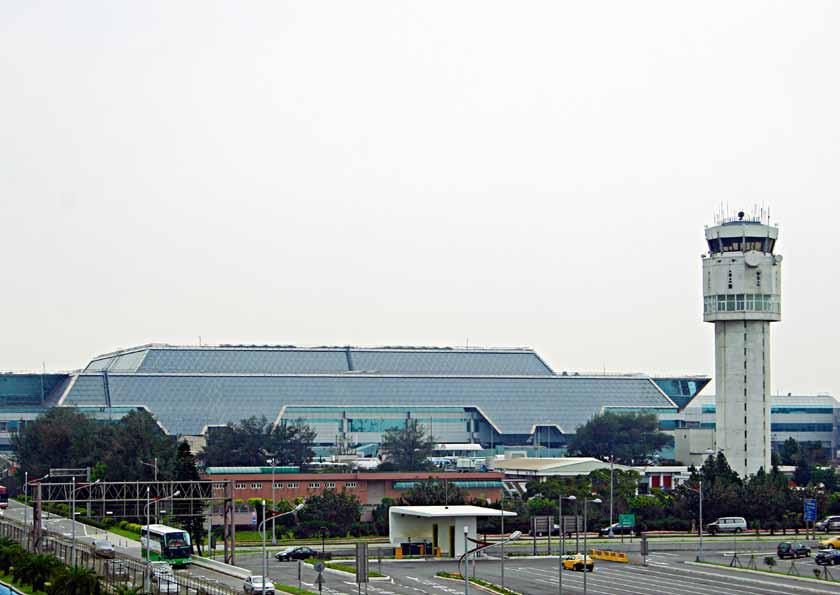 Taiwan Taoyuan Seeks Success by Ken Donohue TPE s Terminal 2, opened in 2000, and the air traffic control tower.