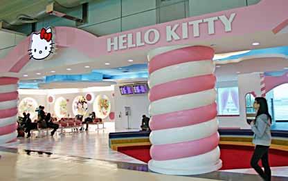 The Hello Kitty lounge in T2, and the startling Hello Kitty self check-in area. The lobby of the Novotel, some of whose rooms have excellent views over the runways.