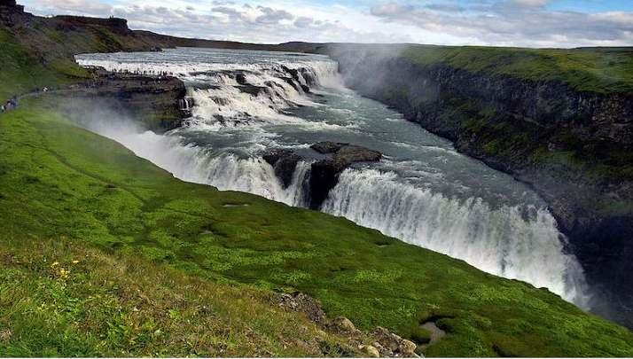 the most attractive of the Icelandic waterfalls, dropping in two stages a total of 62 metres into a narrow gorge.