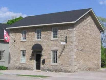 1820) originally looked like the white plaster coated stone building beside it ( the 1812 barracks ).