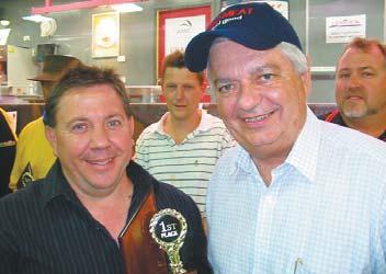 CONGRATULATIONS TO OUR STATE SAUSAGE KINGS Sausage King Mark Nolan and his Traditional category trophy COUNTY and regional butchers upstaged their city cousins to claim all five categories in the